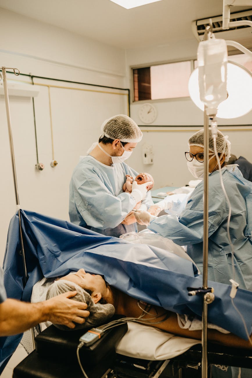 woman lying inside delivery room